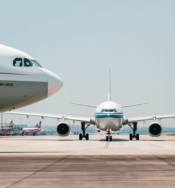 Airplanes waiting on a runway Airplanes waiting on a runway